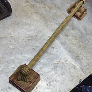 Elegant Gold and Brown Curtain Rod